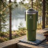 1200ml Insulated Travel Tumbler in green color against a natural background, perfect for outdoor adventures.