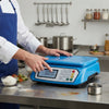 Digital Electronic Weighing Scale with LCD Display & Keypad in kitchen with chef using keypad.