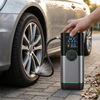 150PSI Dual-Screen Portable Air Compressor inflating a tire with a digital display and pressure reading