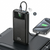 10000mAh 22.5W Fast Charge Power Bank charging a smartphone, showing battery percentage and sleek design.