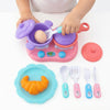 Child playing with the Pretend Play Breakfast Kitchen Set, using utensils and colorful play food.