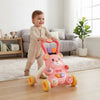 A happy toddler using the 2-in-1 Little Bear Baby Walker with Adjustable Design to practice walking.