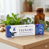 Natural Menthol Ointment Breathing Relief Balm on a wooden table with herbal ingredients for pain relief.