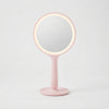 LED Hand Mirror with Integrated Lighting in pink with built-in LED illumination for everyday grooming.