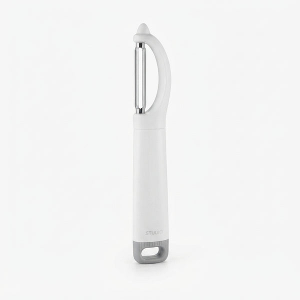 Multi-Functional Stainless Steel Vegetable Peeler with ergonomic handle for easy vegetable and fruit prep.