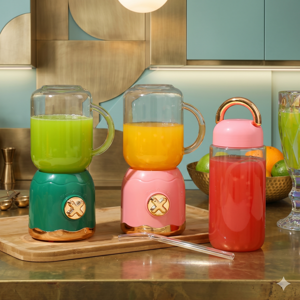 Portable USB Rechargeable Double Cup Juicer in green, pink, and red with fresh smoothies on display.