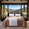Soft Printed Blanket draped over a cozy bed with a mountain view, enhancing stylish home décor.