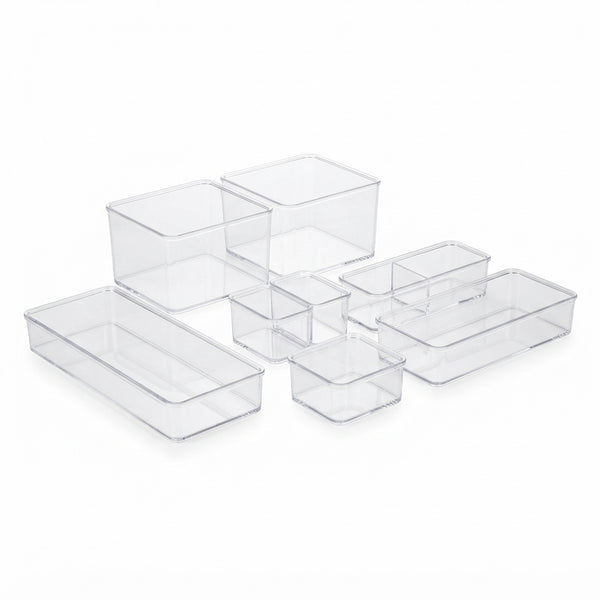 Seven-Piece Storage Box Set featuring clear containers in various sizes for organizing household items.
