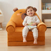 Childrens Animal Sofa Chair with a child happily reading a book while seated comfortably.