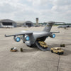 Military Transport Aircraft Toy Set with a large aircraft and miniature vehicles on a tarmac.