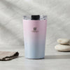 350ml Stainless Steel Travel Mug with pink and blue gradient design and transparent lid on a stone background