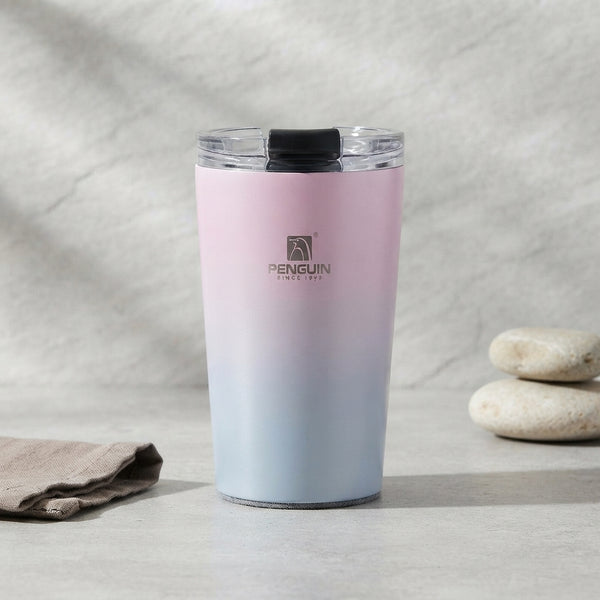 350ml Stainless Steel Travel Mug with pink and blue gradient design and transparent lid on a stone background