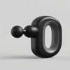 Donut-Shape Handheld Massager displayed at an angle highlighting its compact, rounded design and distinct grip feature.