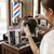 Barber using 12 Piece Professional Barber Hair Sectioning Clips on a client's hair for precision styling.