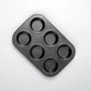 6 Cup Non-Stick Carbon Steel Muffin Pan with six cavities for baking muffins or cupcakes.