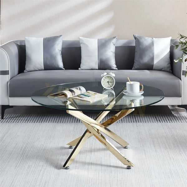 Luxury Round Dining Table featuring a modern glass top and elegant gold base, paired with a stylish gray sofa.