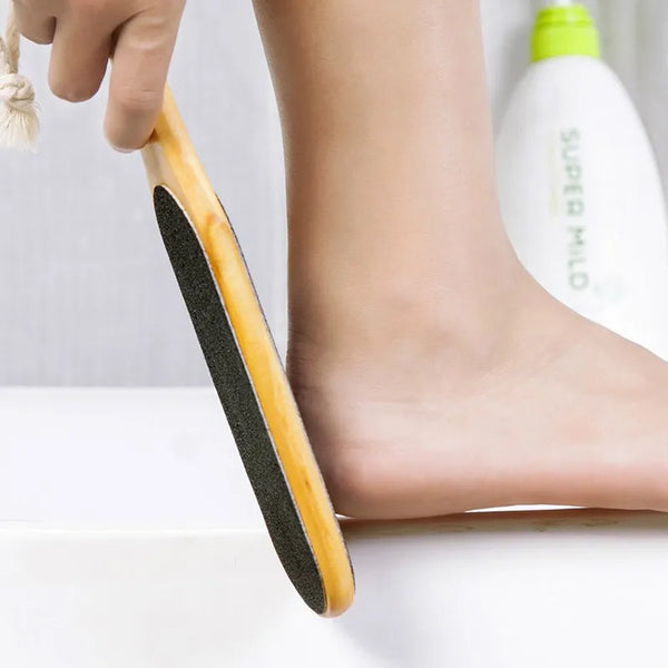 Foot Rub Exfoliating Scrub Grinding Stone in use on a foot for smooth and healthy results.
