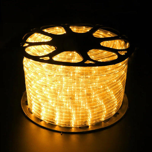 100m Heavy Duty Extension Cable Reel on a spool with bright yellow lights, ideal for long-distance electrical use.