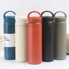 Stainless Steel Wide Mouth Sport Thermos in various colors lined up on a table.