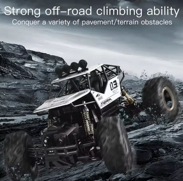 High Quality 4WD Alloy Climbing Off-Road Truck conquering tough terrain obstacles with strong off-road climbing ability.