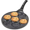 7-Hole Smile Face Non-Stick Breakfast Pan with smiley pancakes cooking.