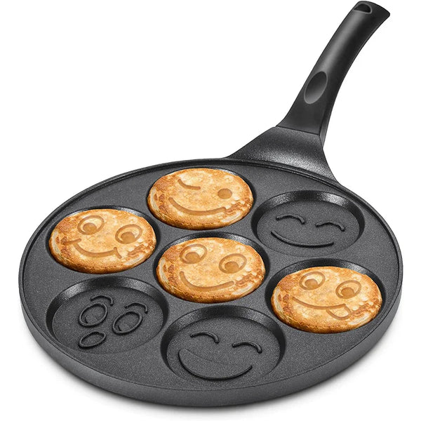 7-Hole Smile Face Non-Stick Breakfast Pan with smiley pancakes cooking.
