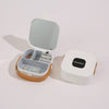 Compact Travel Jewelry Organizer with Integrated Mirror displaying compartments for jewelry.