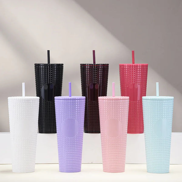 Matte Black Studded Bling Cup Tumbler alongside colorful reusable drink cups in various shades and designs.