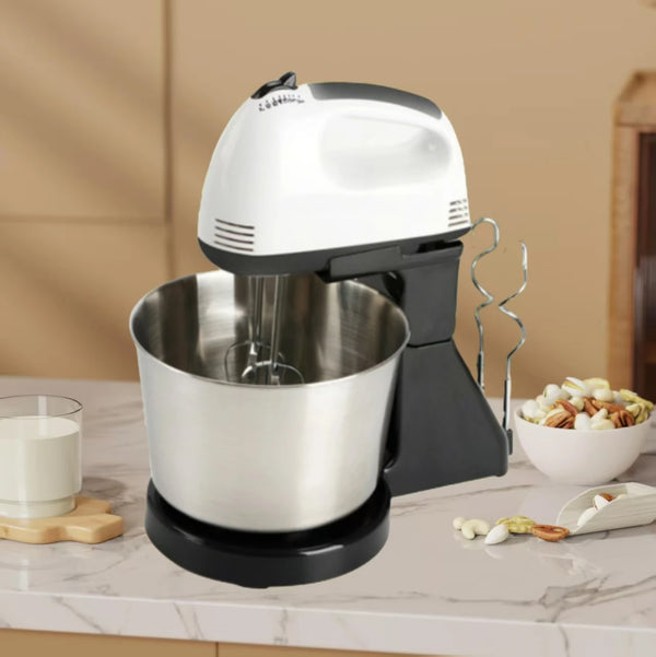 12L Automatic Multi-Functional Kitchen Juicer with stainless steel bowl and beaters on a kitchen counter.