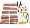 93 Piece Tire Repair Tool Set including tire repair strips, pliers, and various essential tools for effective tire repair.