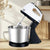 12L Automatic Multi-Functional Kitchen Juicer and Meat Grinder on a kitchen countertop with stainless steel mixing bowl.