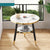 Round Marble Effect Side Table with Gold Trim and Lower Shelf featuring marble top and gold trim in a living space.