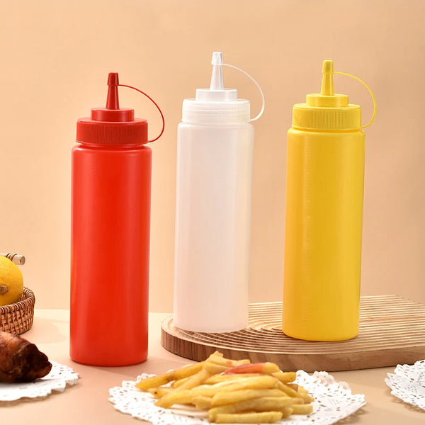 Food Grade Squeeze Sauce Bottle Set featuring red, white, and yellow squeeze bottles for easy condiment dispensing.