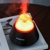 USB Mini Volcano Humidifier creating a soothing mist with glowing light, perfect for improving air quality in any room.