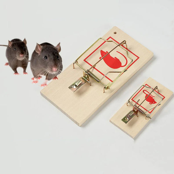 Heavy Duty Wooden Snap Mousetrap with two mice nearby demonstrating effective rodent control.