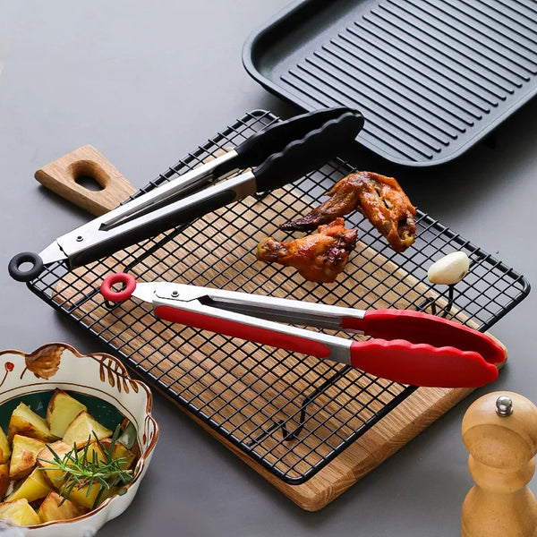 Heat Resistant Silicone Tipped Stainless Steel Tongs displayed with grilled chicken and roasted potatoes
