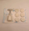 Hand Press Mooncake & Pastry Mold Set with pressing tool and detailed molds for creating mooncakes and pastries.