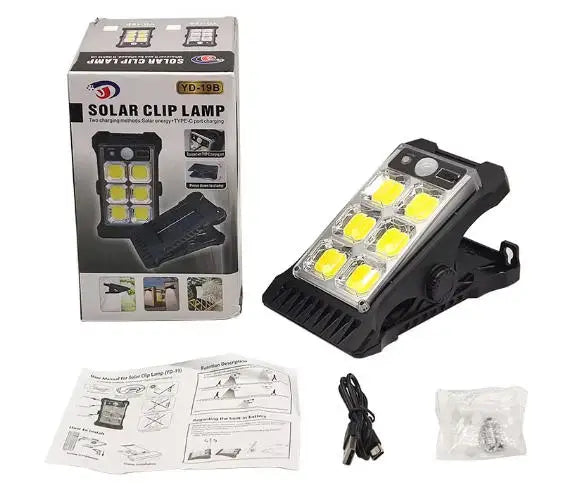 Portable Solar Clip Lights Motion Sensor with instructional materials and accessories.