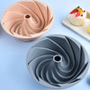 Silicone Spiral Chiffon Cake Mold in pink and gray colors, features modern grooved design for elegant baking.