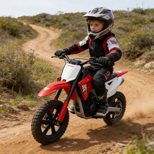 Child riding the 24V Electric Dirt Bike on a dirt trail in a helmet and protective gear.