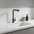 Matte Black Single Handle Kitchen Sink Faucet installed in a modern kitchen with minimalistic design.