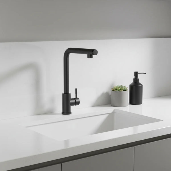 Matte Black Single Handle Kitchen Sink Faucet installed in a modern kitchen with minimalistic design.
