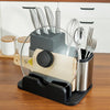Stainless Steel Eco-Friendly Kitchen Tool with utensils and a knife block on a wooden countertop