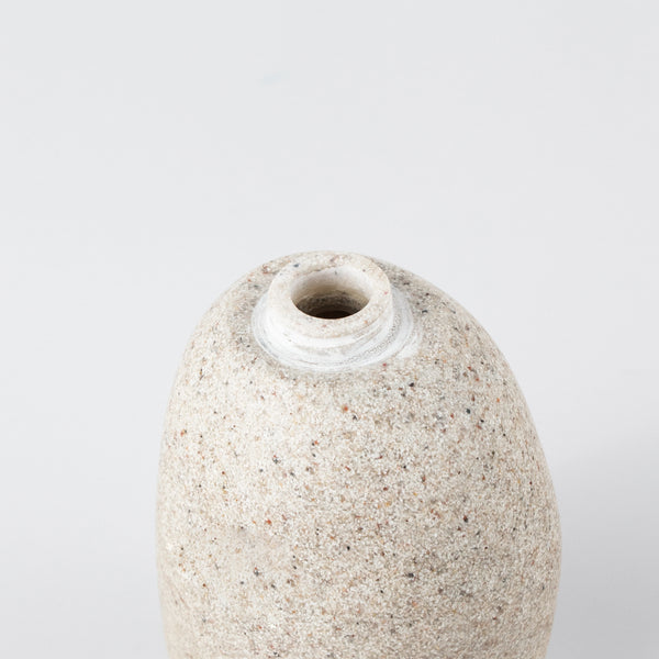 Home Decor Vase Luxury Hand Wash Soap Dispenser with a textured stone-like finish.