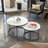 Round Marble Effect Nesting Coffee Tables with Black Metal Frame in stylish living room setting.