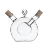 Dual-Core Borosilicate Glass Oil & Vinegar Dispenser showcasing its elegant design with separate chambers.