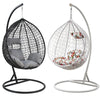 Grey Garden Outdoor Hanging Chair in black and white designs with comfortable cushions for relaxing moments.