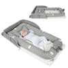 Fashionable 2 in1 Baby Travel Bed with a sleeping baby in cozy design.