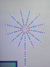USB Firework LED Night Light with App and Music Sync creating a colorful display on the wall.