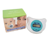 Digital LCD Baby Pacifier Thermometer with packaging and baby illustration.